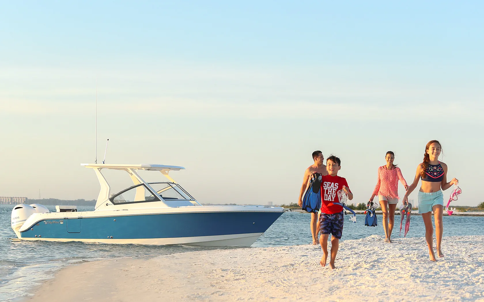 Family enjoying a day of fishing and cruising on the EdgeWater 262CX.