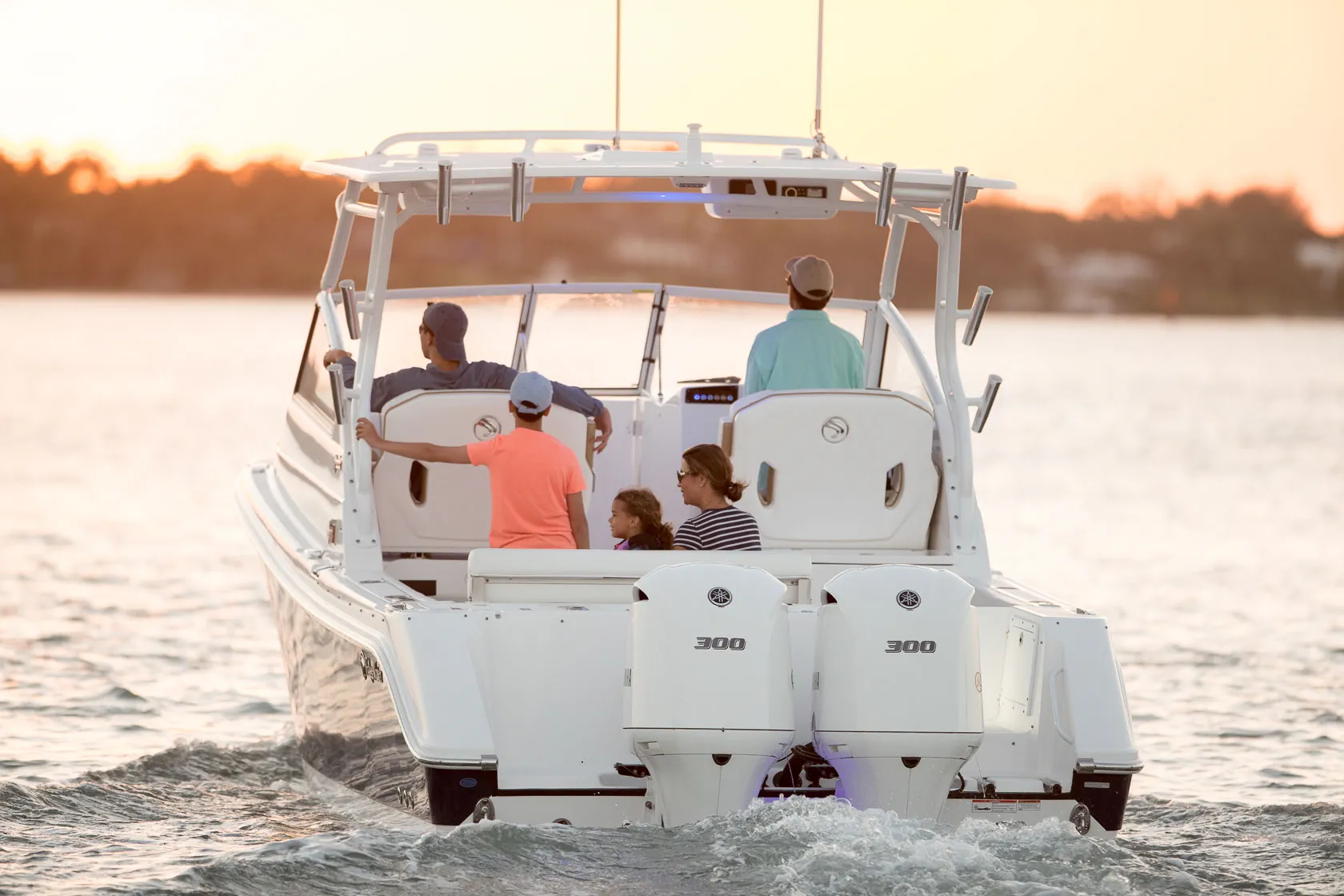 Family enjoying fishing and cruising on an EdgeWater 280CX.